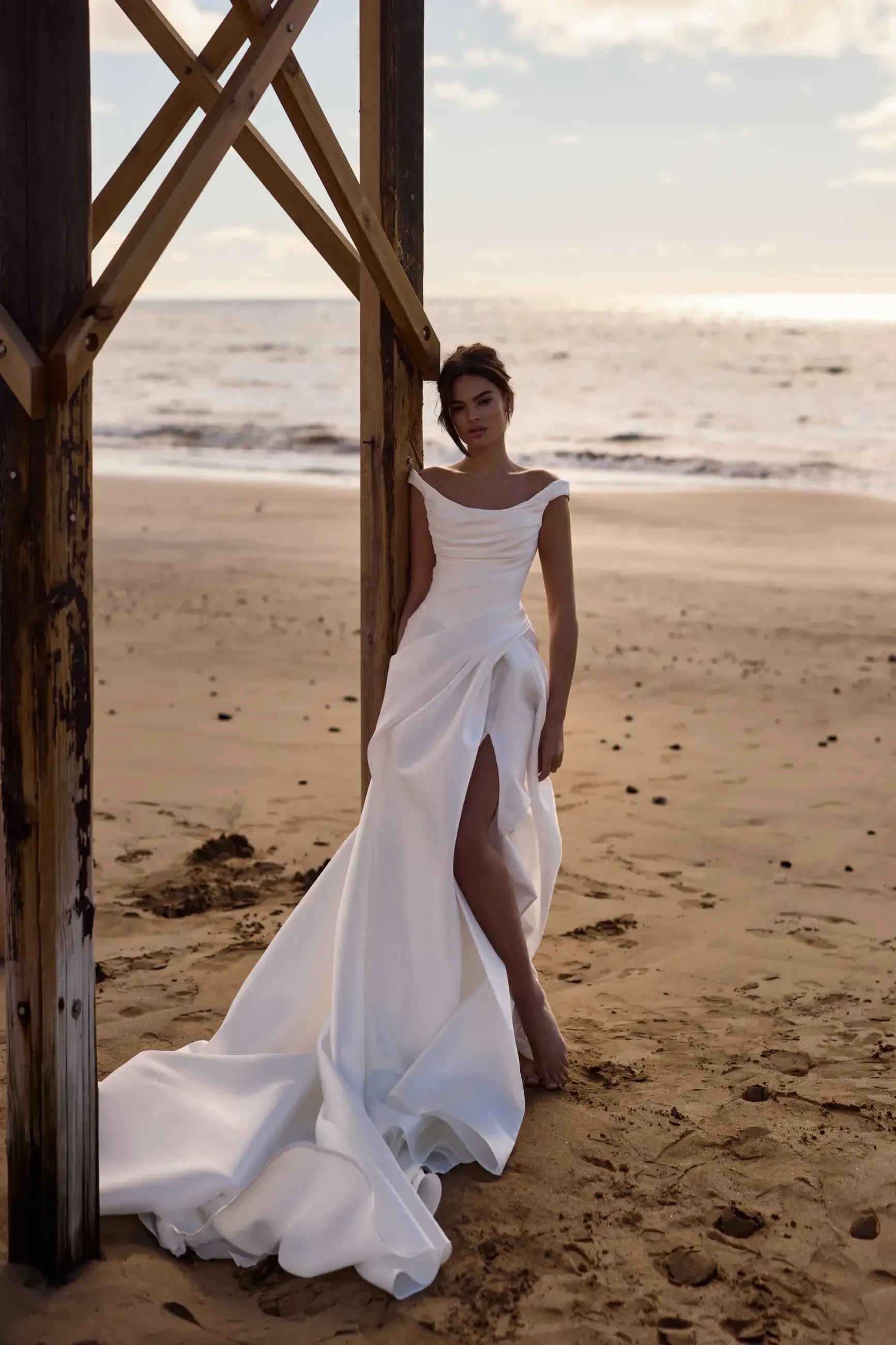 model is wearing a scoop neck a-line bridal gown