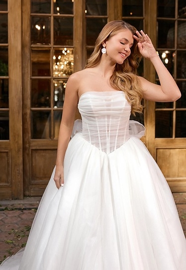 Photo of the model wearing a bridal gown